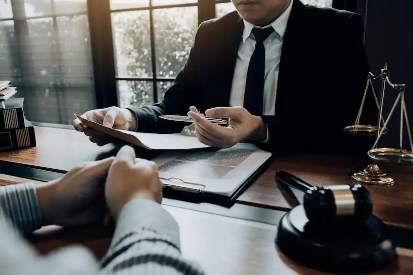 Nashville domestic violence lawyer reviewing a client's criminal defense in a consultation