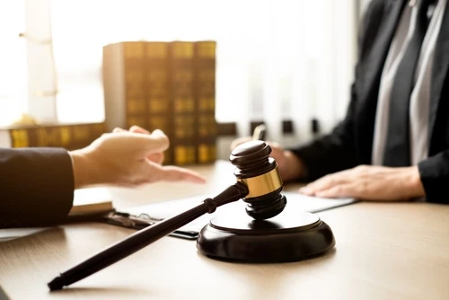 A Nashville criminal defense lawyer negotiates for a plea deal with a prosecutor.