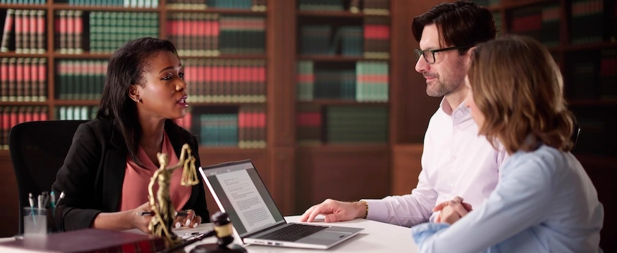 A Nashville sex crimes lawyer from The Law Office of Jeffrey Jackson is speaking with a couple.