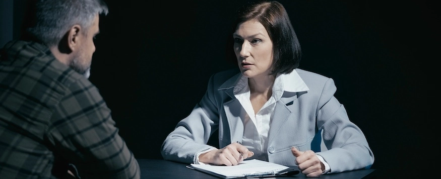 A Nashville violent crimes lawyer is speaking with a client.